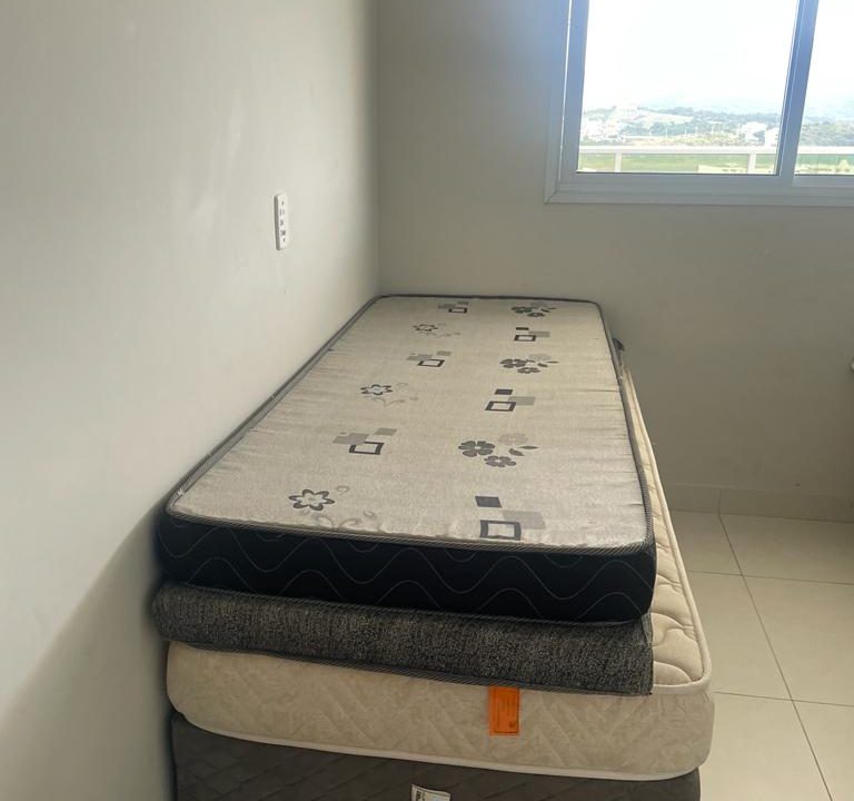 cama-quarto-helio-rosa-praia-morro-guarapari